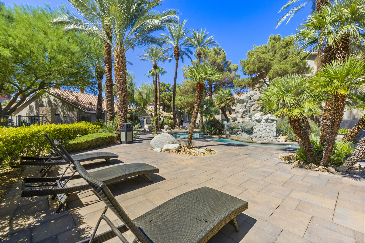 Relax in the sunloungers by the pool 