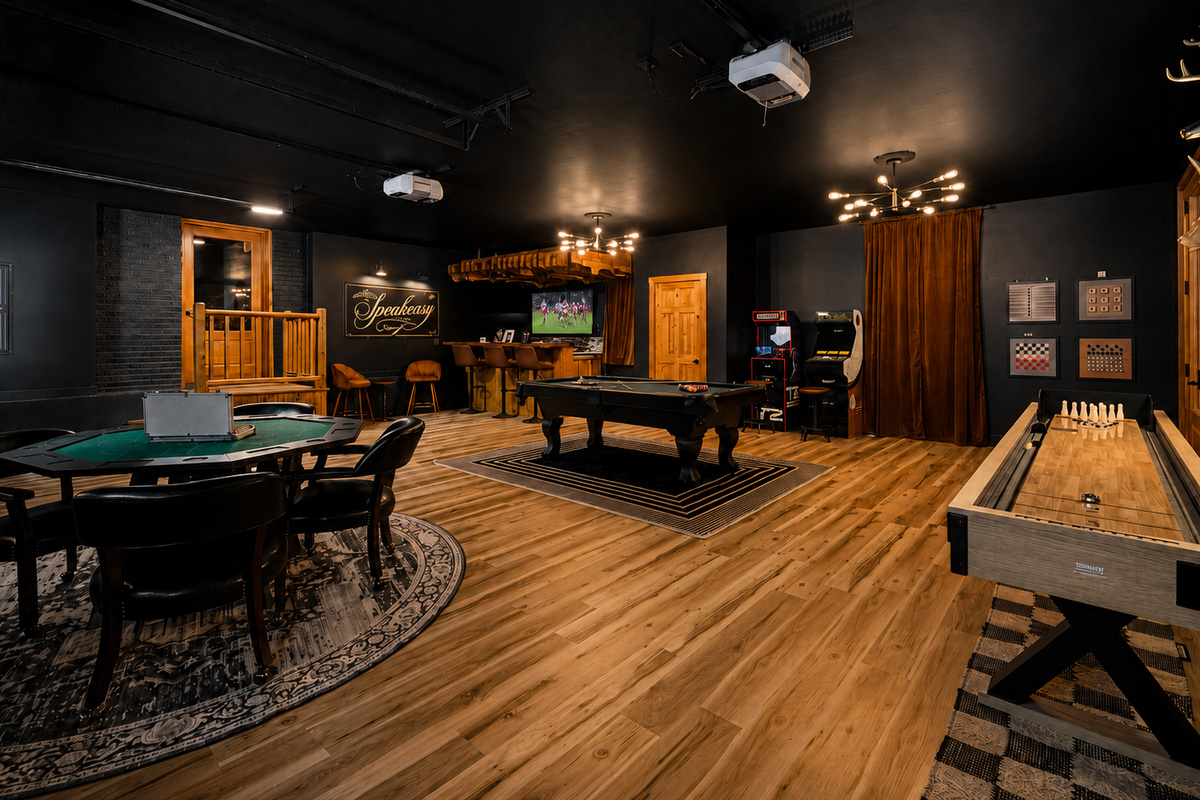 {Speakeasy Game Room} Pick your game, pour a drink, and let the night unfold with pool, shuffleboard, poker, darts, and classic arcade competition.