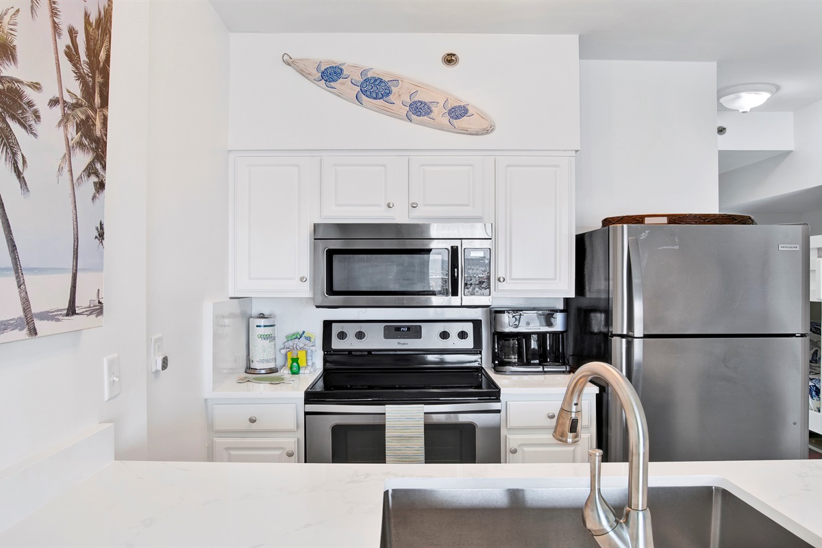 Kitchen with stainless appliances and Gulf view