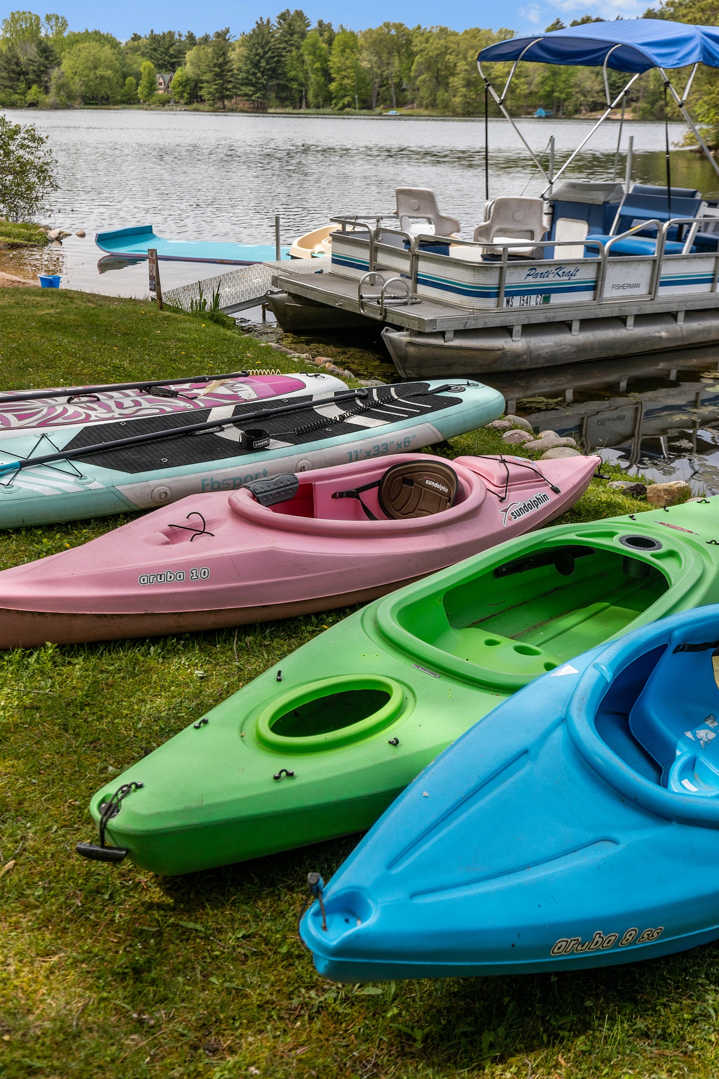Adventure awaits with a pontoon boat, kayaks, paddle boards, and a pedal boat—all included for your enjoyment!