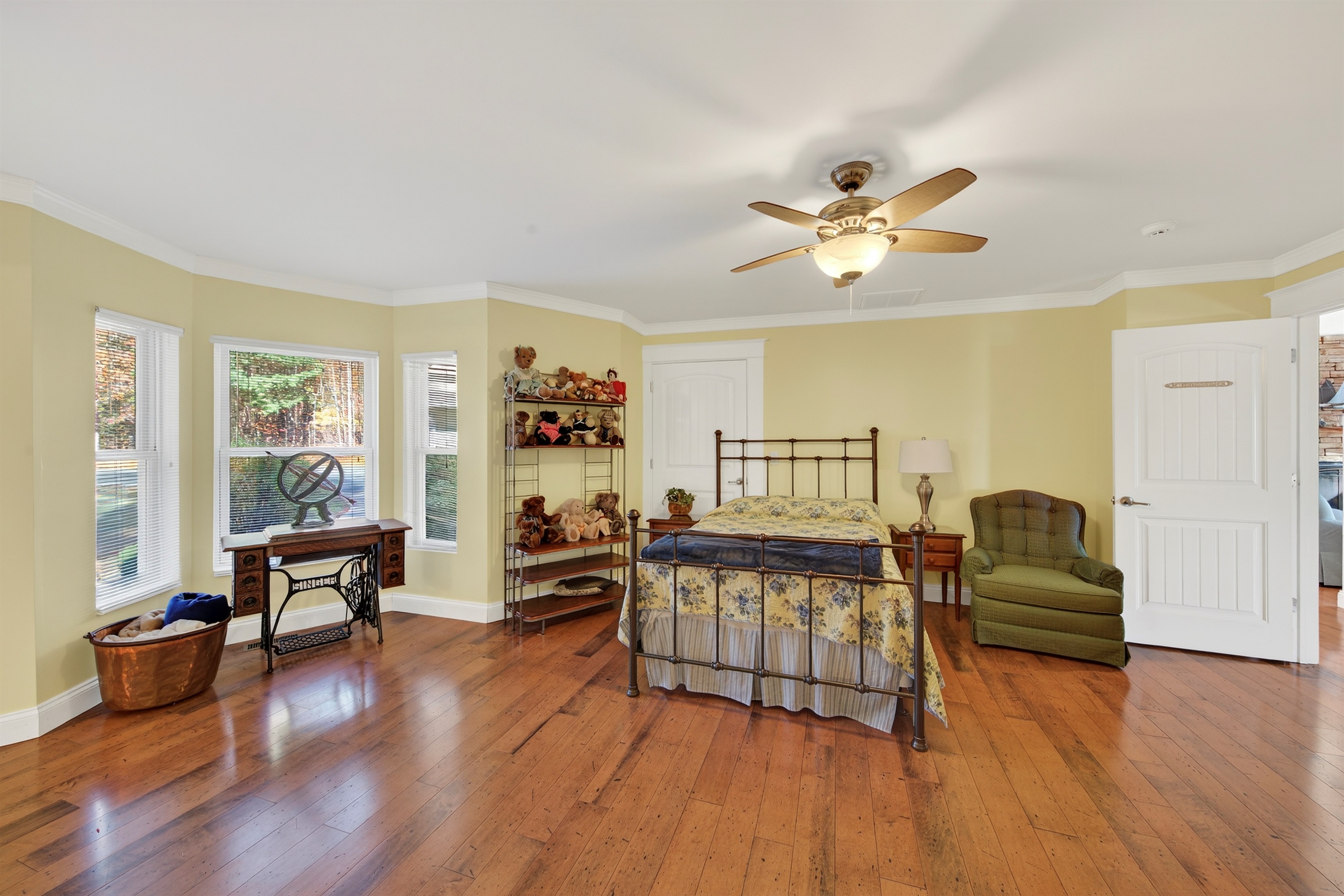 Warm, sunny space with hardwood floors and charming decor.