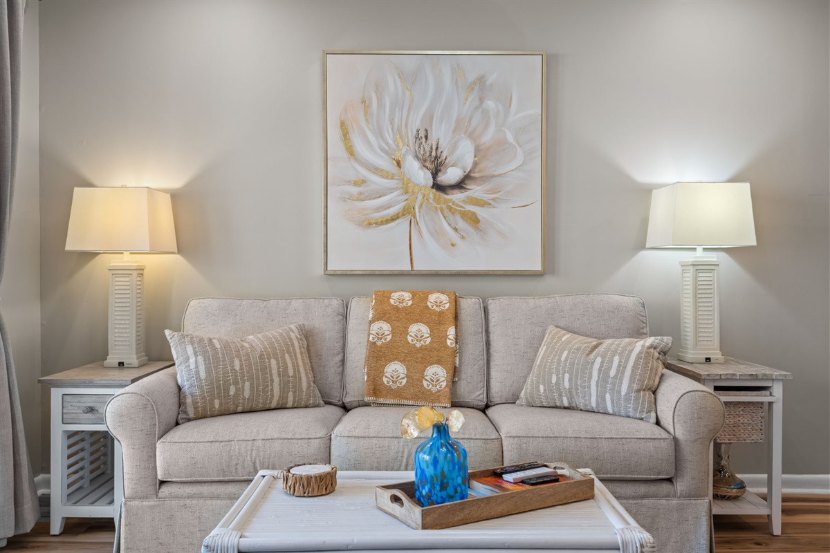 Cozy seating with soft coastal tones&mdash;perfect for unwinding after the beach