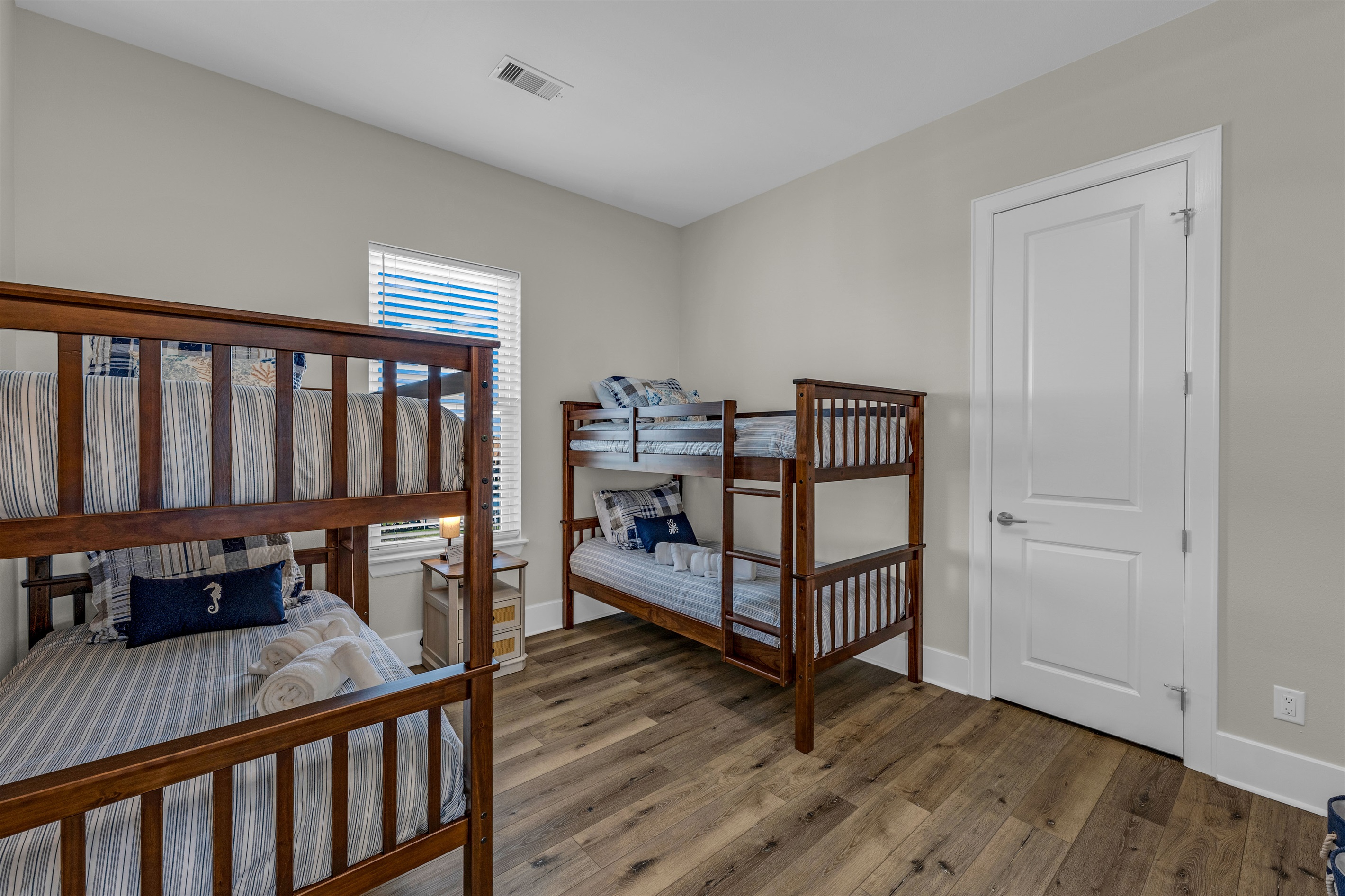 Costa Cristal Bedroom 4: This inviting bunk room combines functionality and comfort, providing a cheerful and organized space for guests of all ages.