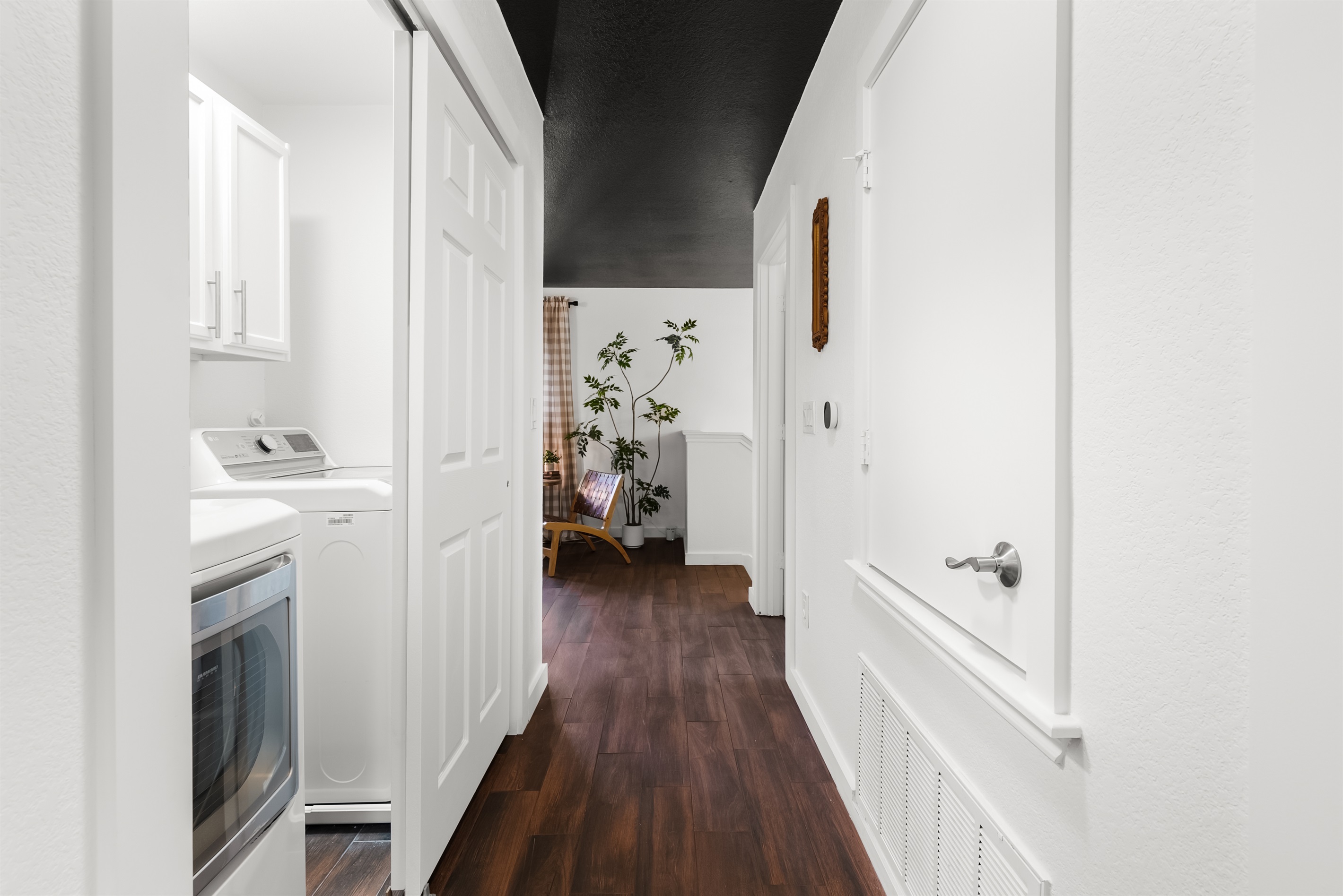 Washer in dryer in upstairs hallway