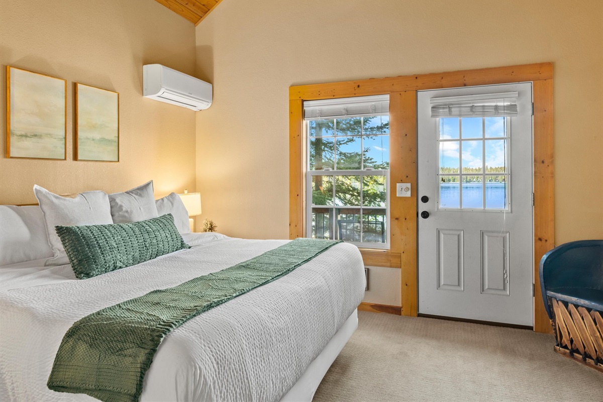 Bedroom 2 — king with lake-view balcony