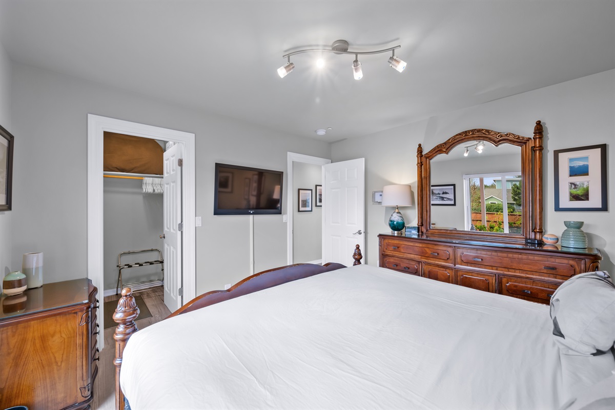 Garden views, 40" SmartTV/cable, and expansive drawer space in the downstairs bedroom