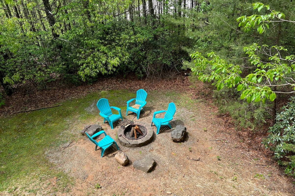Surround by Nature, The Spacious Patio Features a Rustic Fire Pit and Seating Perfect for those Starlit Nights