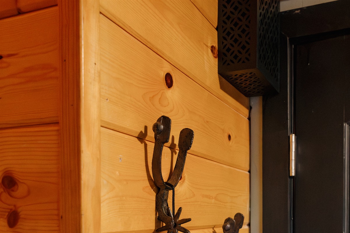 Authentic western details like horseshoe hooks add character at Poppywood Pines. This gothic western Show Low A-frame features thoughtful design touches throughout, creating a unique White Mountains vacation rental experience near hiking, fishing, and skii