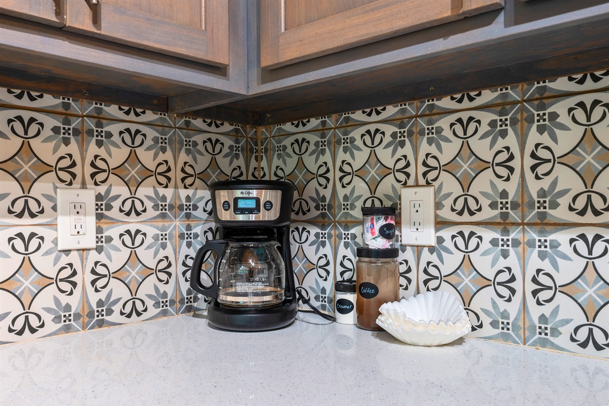 A dedicated coffee station adds a thoughtful touch, making mornings feel just a little more relaxed and enjoyable.