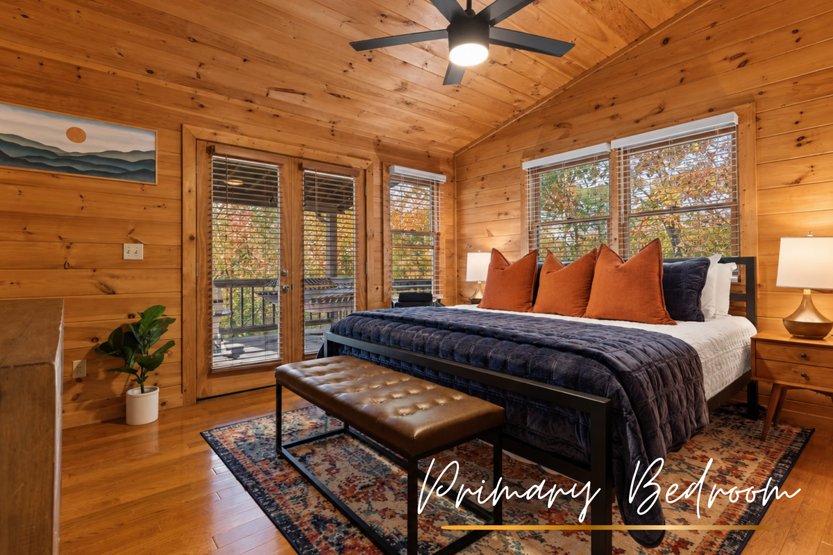The primary king suite blends wood charm with blue accents.