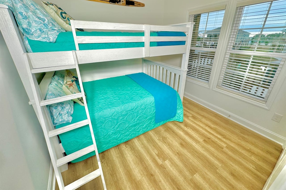 Full-size bunk bed and blackout curtains.