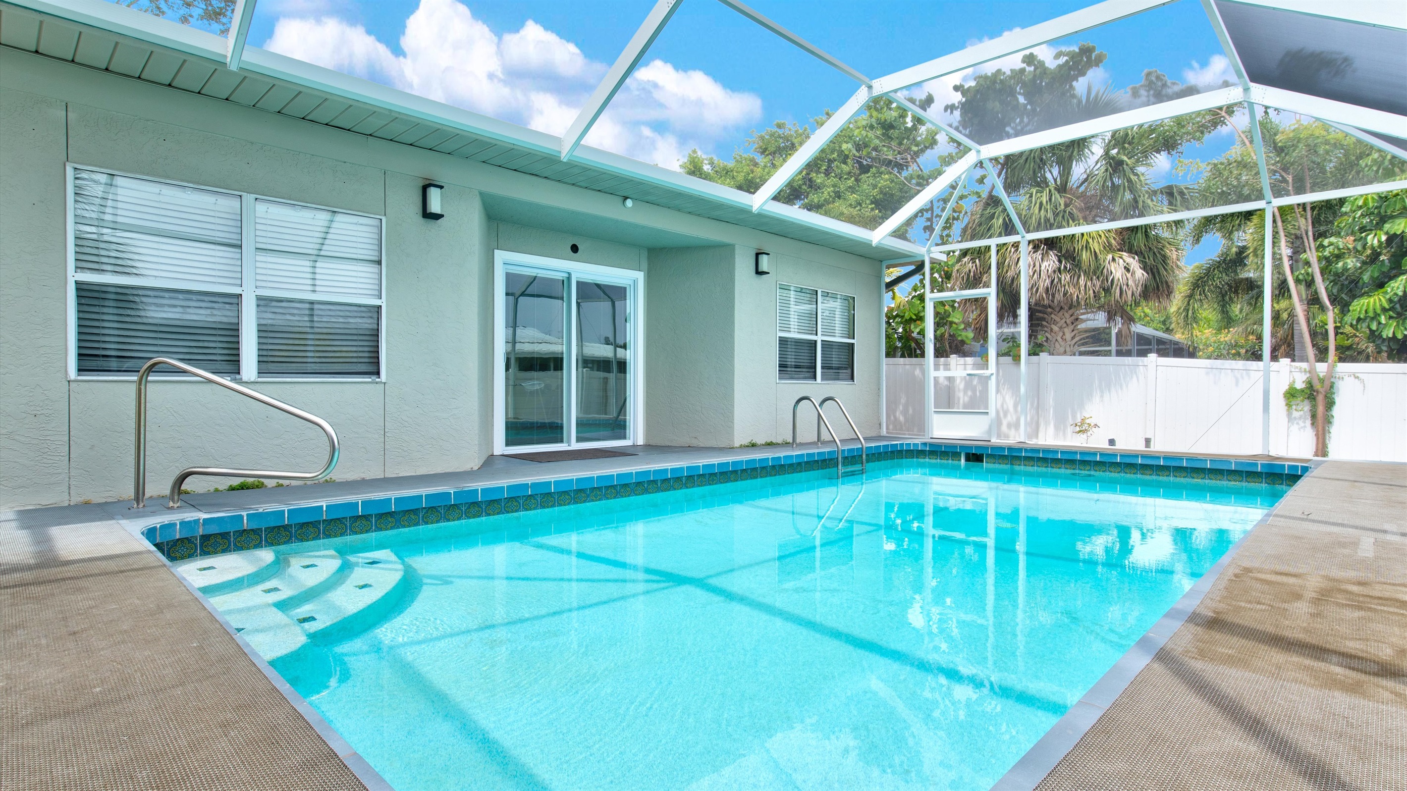 Experience pure relaxation with your very own lanai-covered pool oasis.
