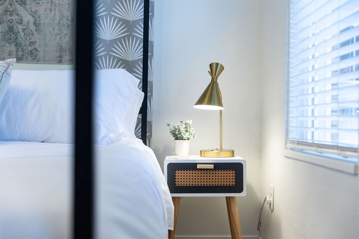 Bed side table with lamp.
