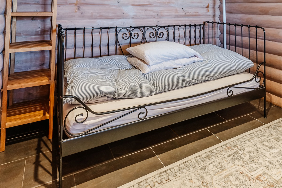 Day bed located in queen bedroom