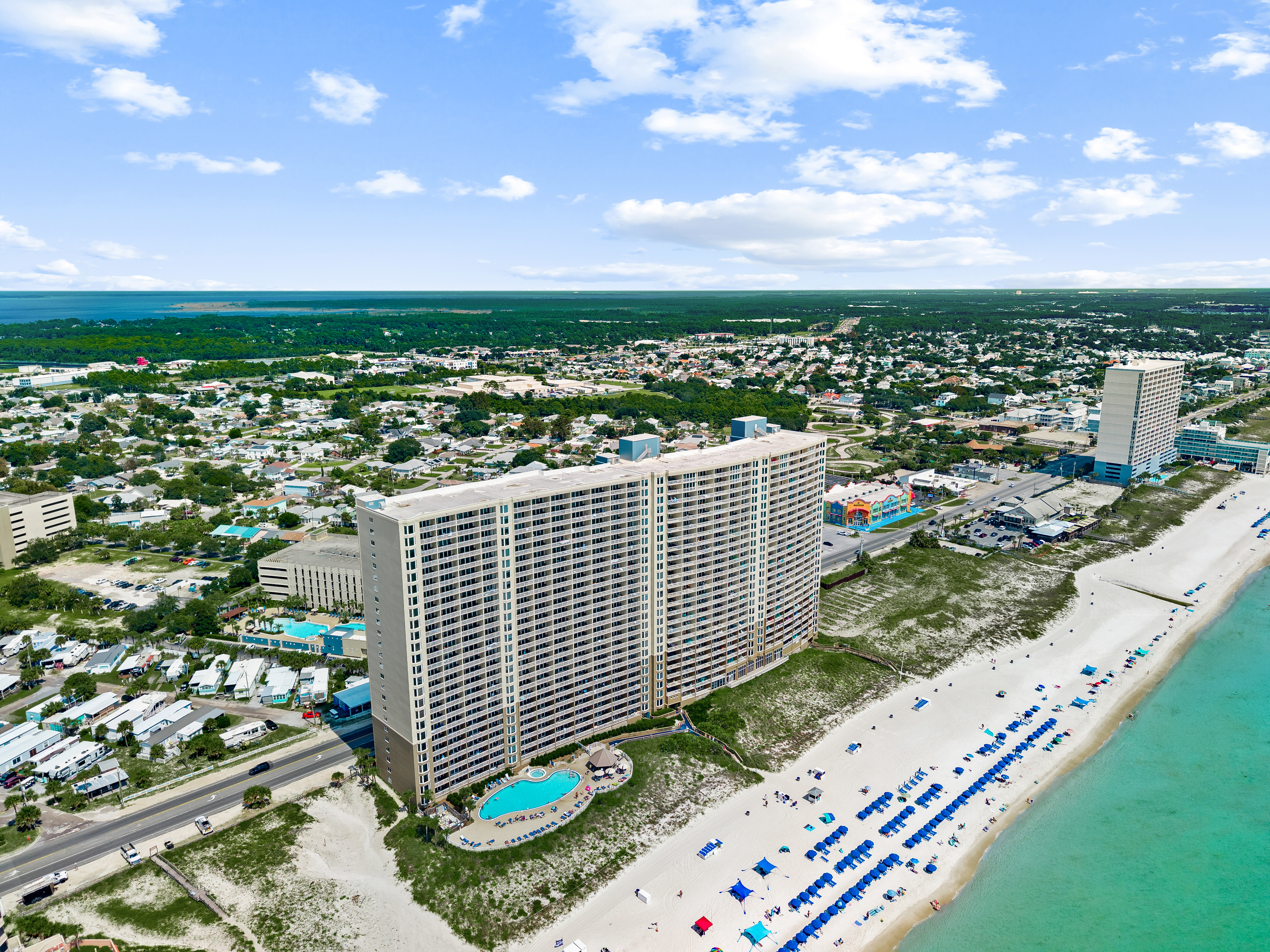 Steps from the sand and surf! Soak up the sunshine at this stunning beachfront resort in Panama City Beach, where breathtaking Gulf views, beach service, and a pool just outside your door create the perfect escape.