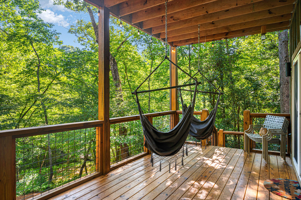 Listen to the rushing water as you swing in the porch hammocks.