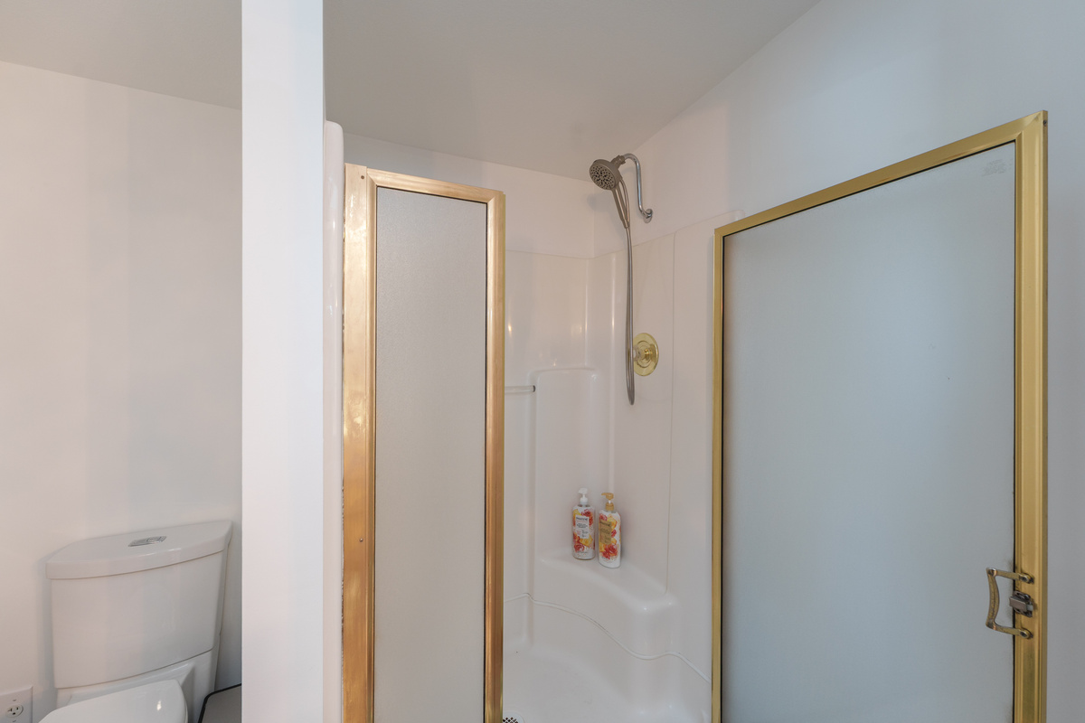 This bathroom is shared with both Bedroom 3 and Bedroom 4. Double sink with stand up shower. 