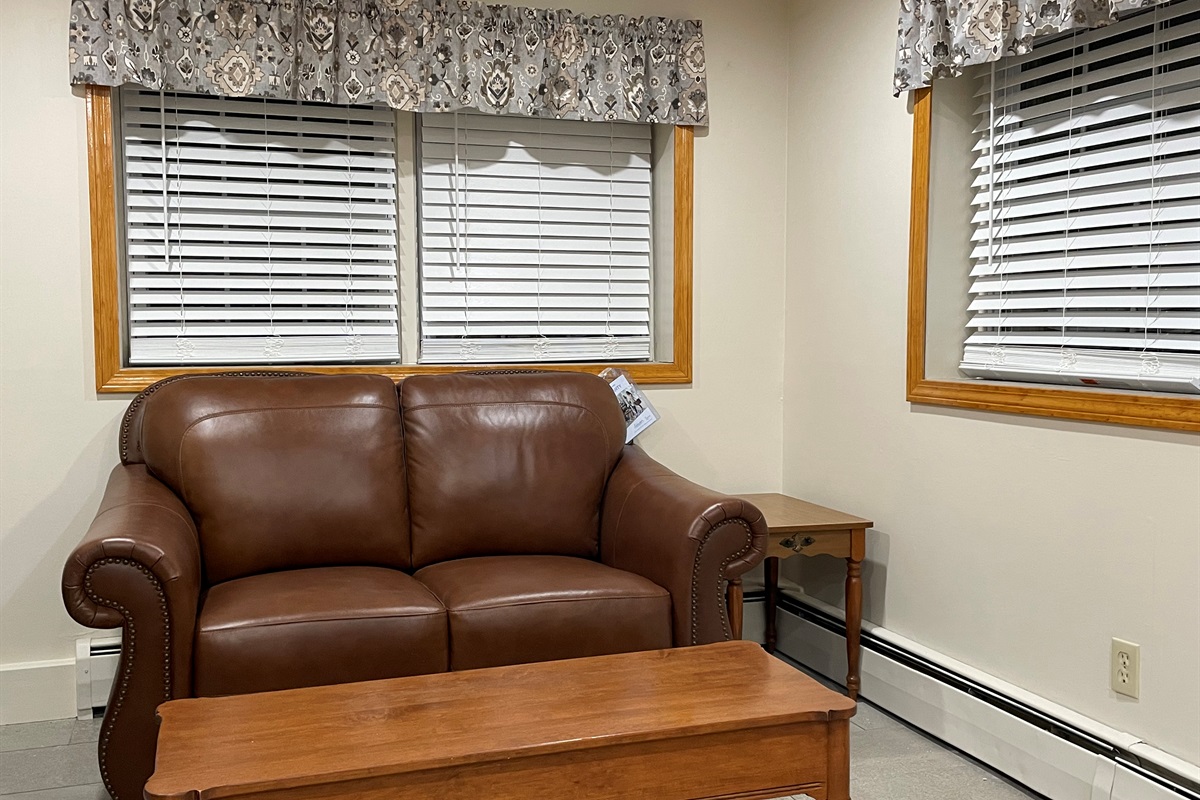 Comfortable seating to relax and watch the large flat screen TV
