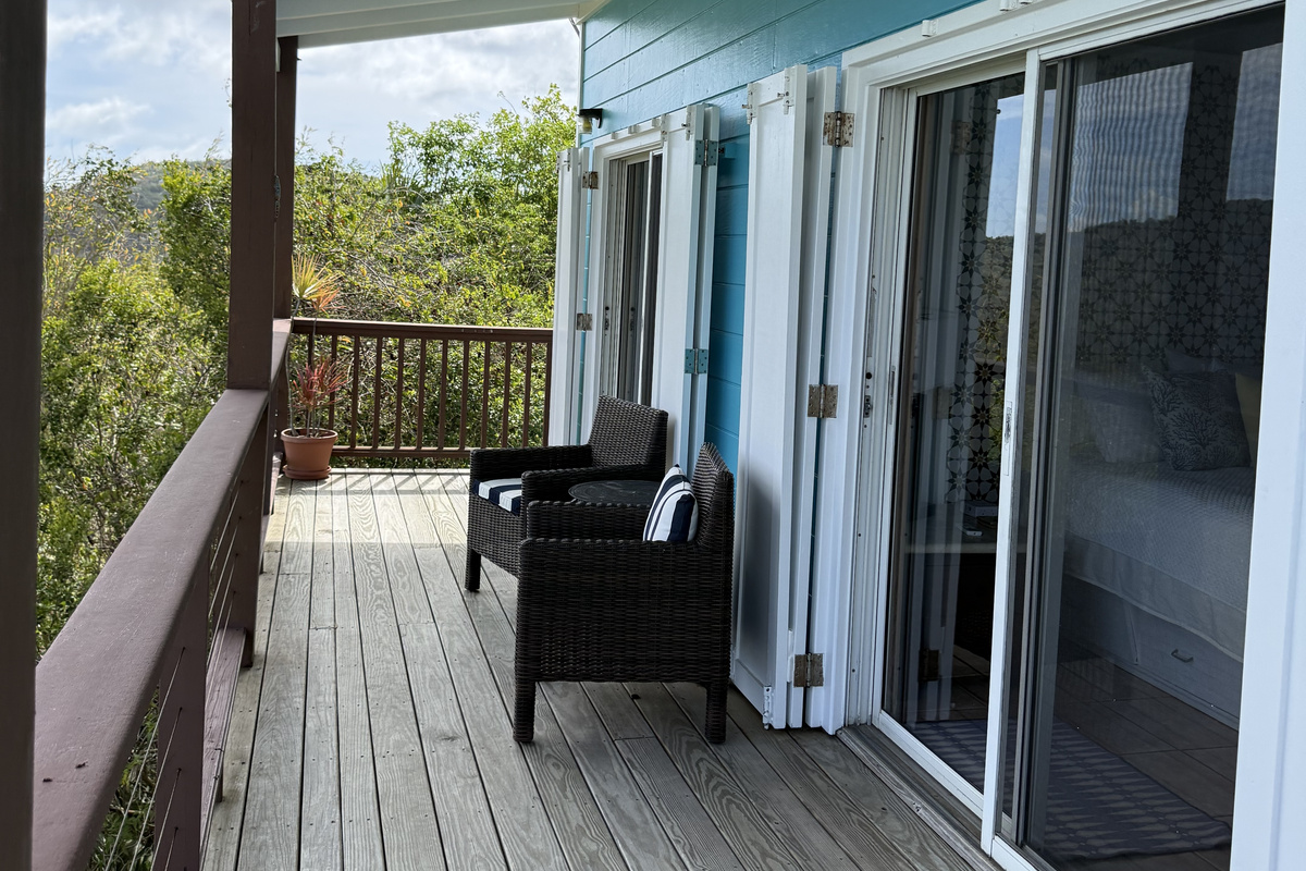 Nice seating area outside the bedrooms. There are two bedrooms connected by a full bath.
