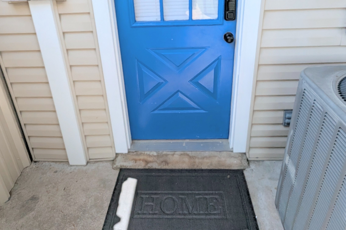 Digital smart lock access to the home is available from both the carport and backyard entrances.