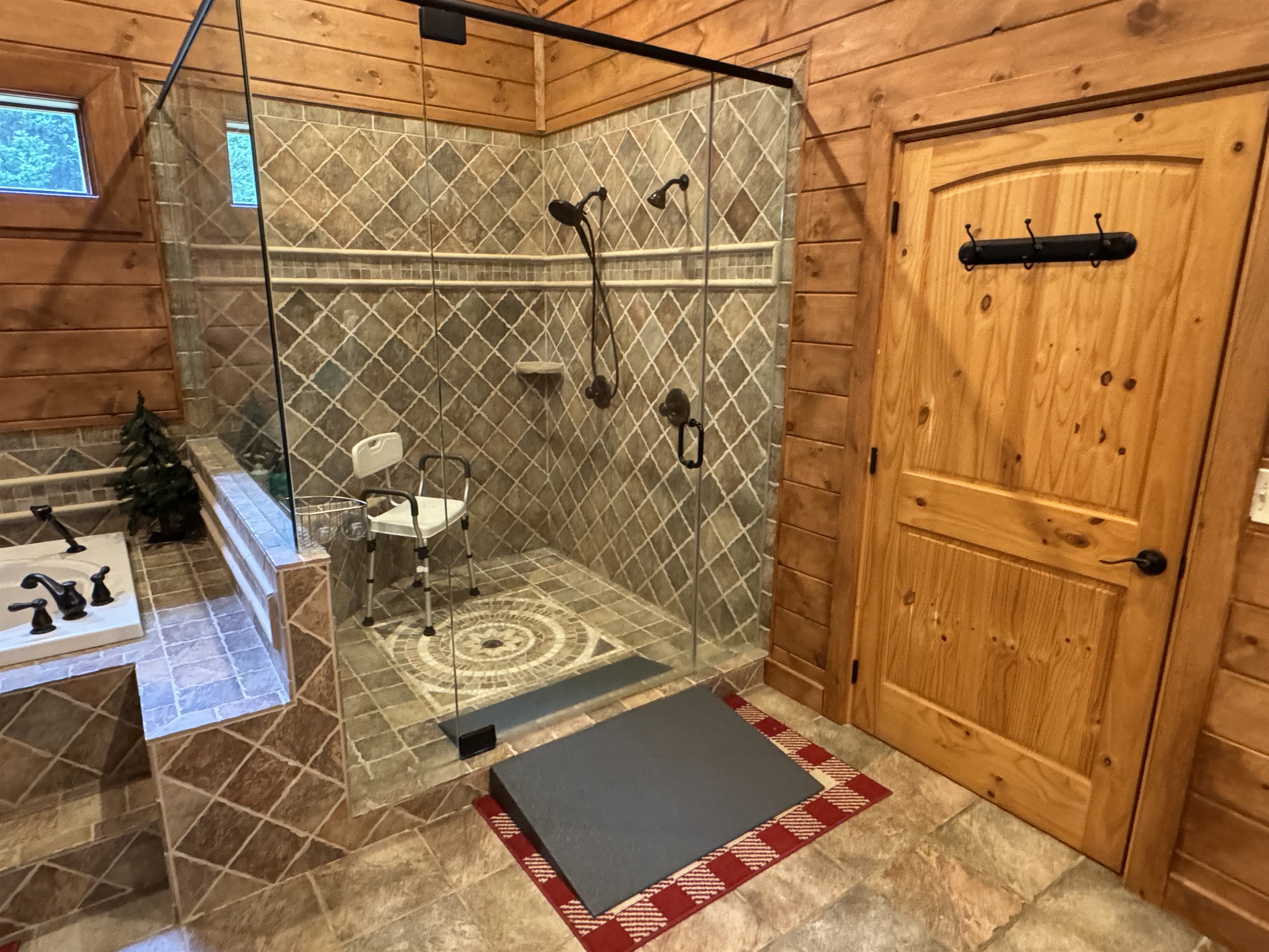 Example of handicap access for Santa Room bathroom.  Ramp and shower seat available upon request.