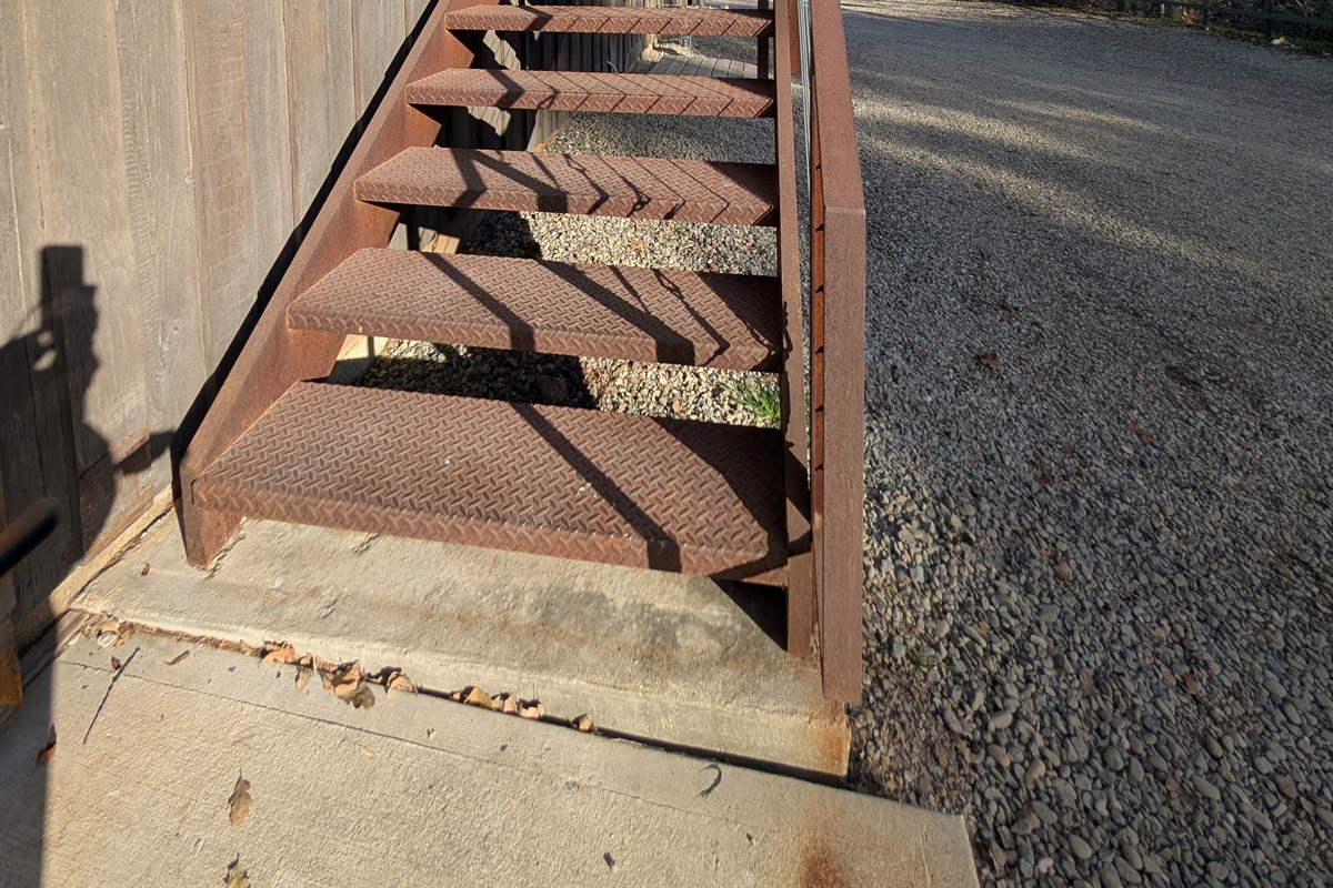 Steep stairs to the barn game room