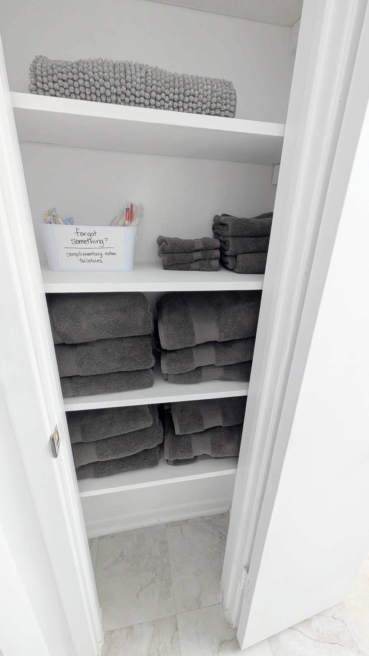 For your comfort, extra towels, toiletries, and bath mats are readily available. 