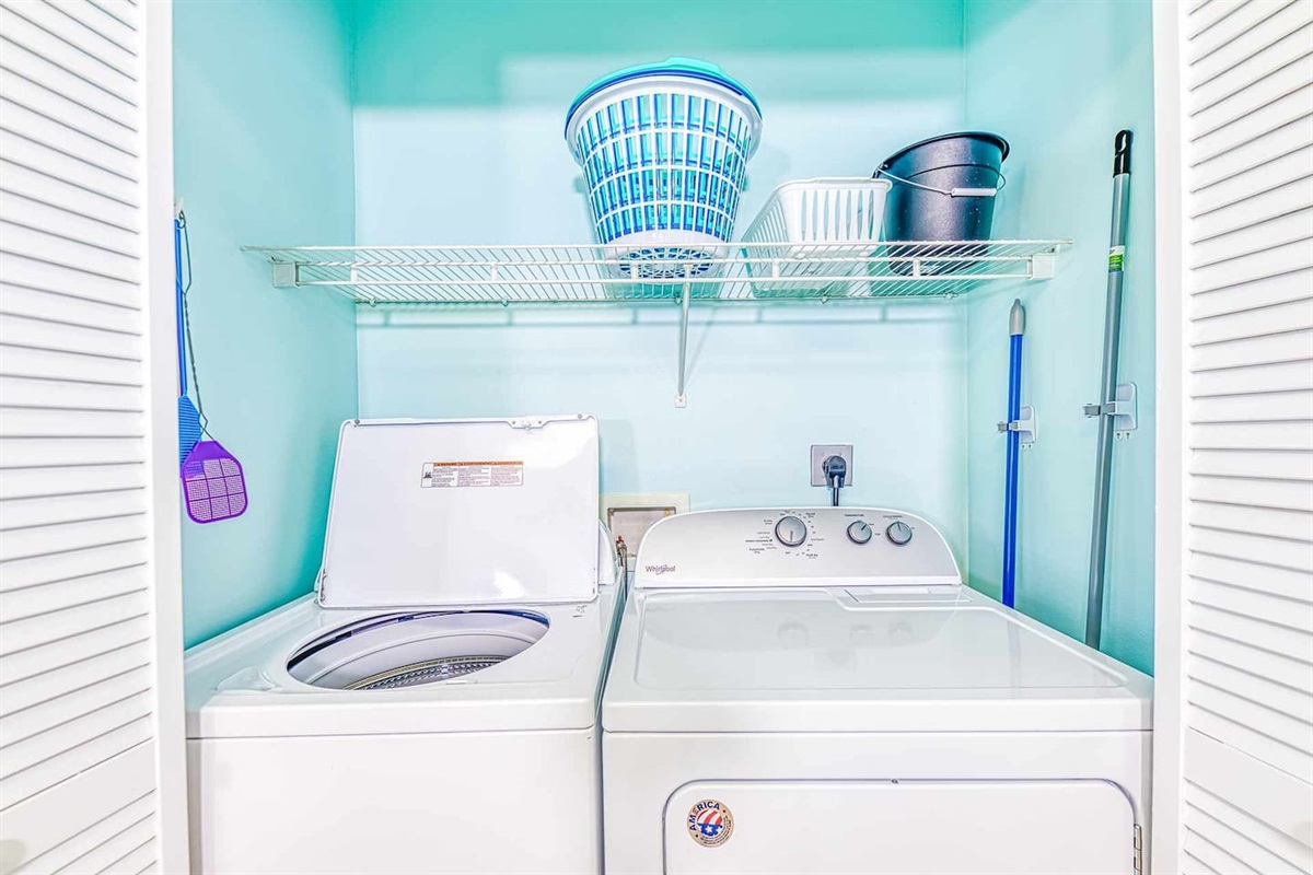 Laundry Room: Keep your beachwear fresh and clean with convenient in-unit laundry facilities!