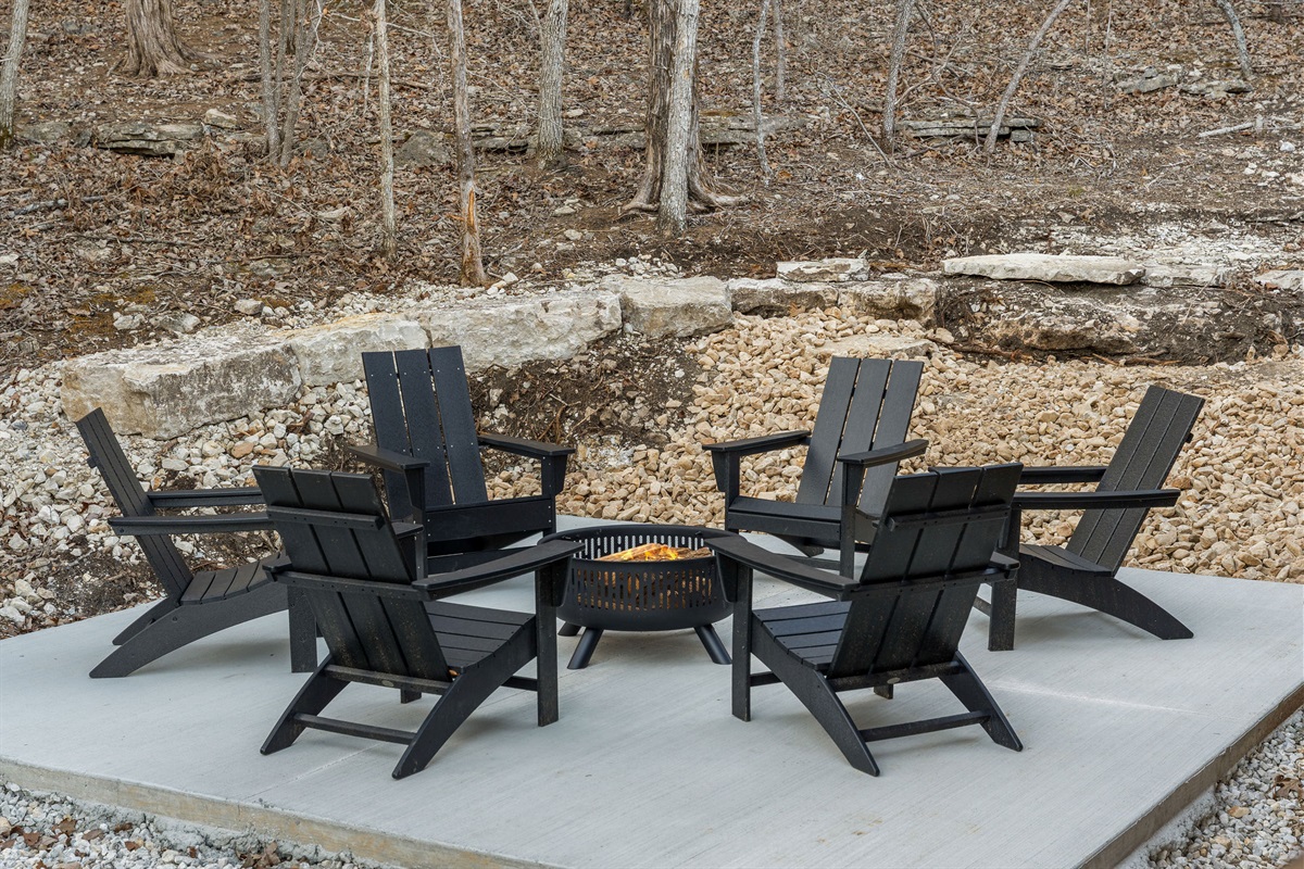 Fire pit area with seating for gathering outdoors.