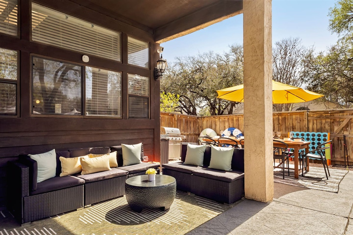 Chill vibes only—kick back in the shaded lounge while the grill sizzles and games await just steps away. ️☀️