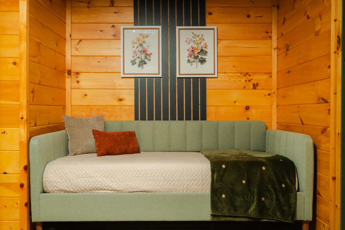Twin daybed offering a cozy additional sleeping space in the family bedroom.