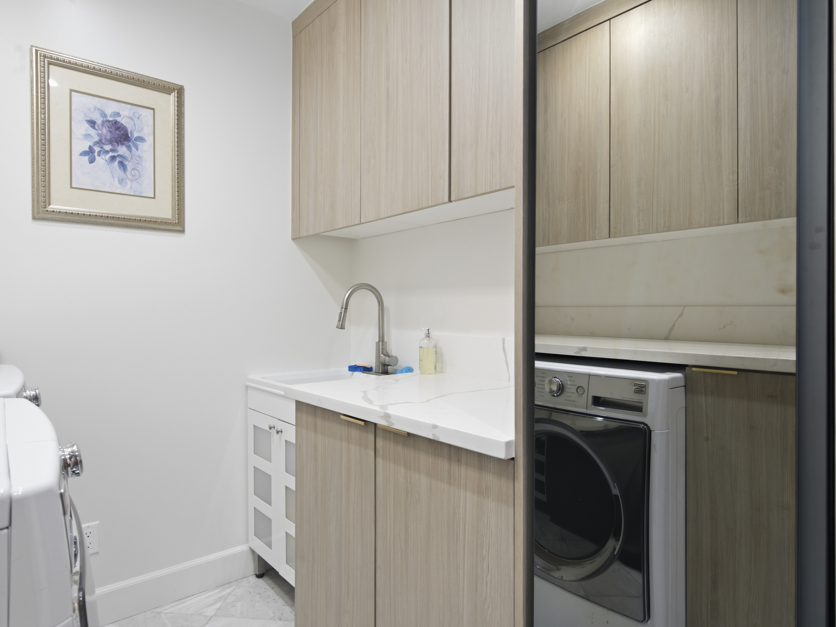 Enjoy the convenience of having a laundry room right at home.