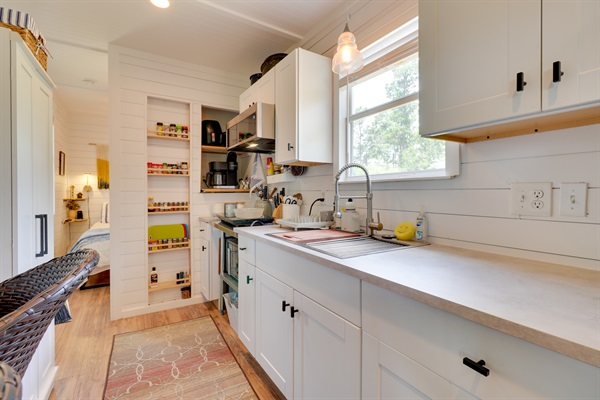 Kitchenette with full size sink and plenty of counter space for easy meal prep.