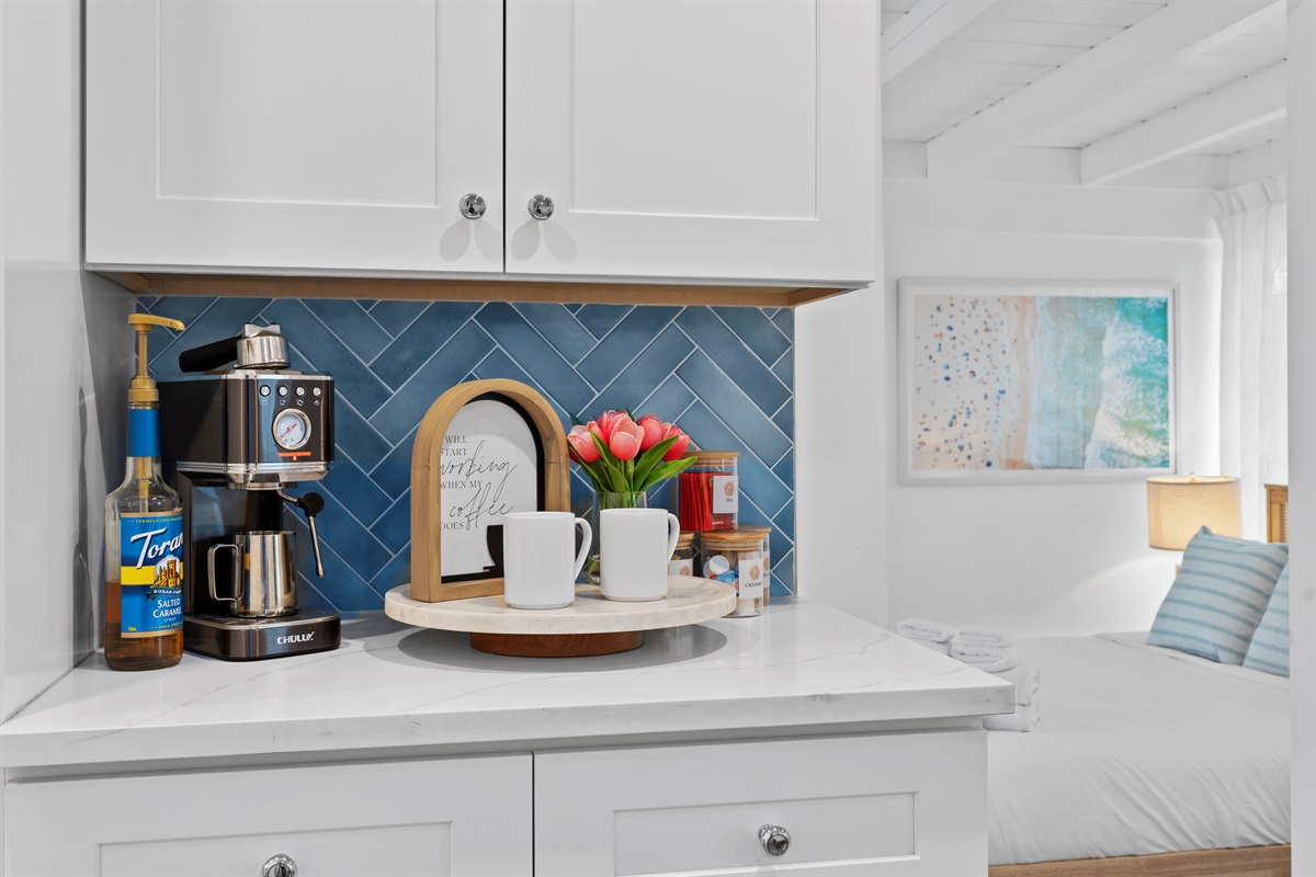 Morning coffee tastes better in this charming coastal-inspired kitchenette.