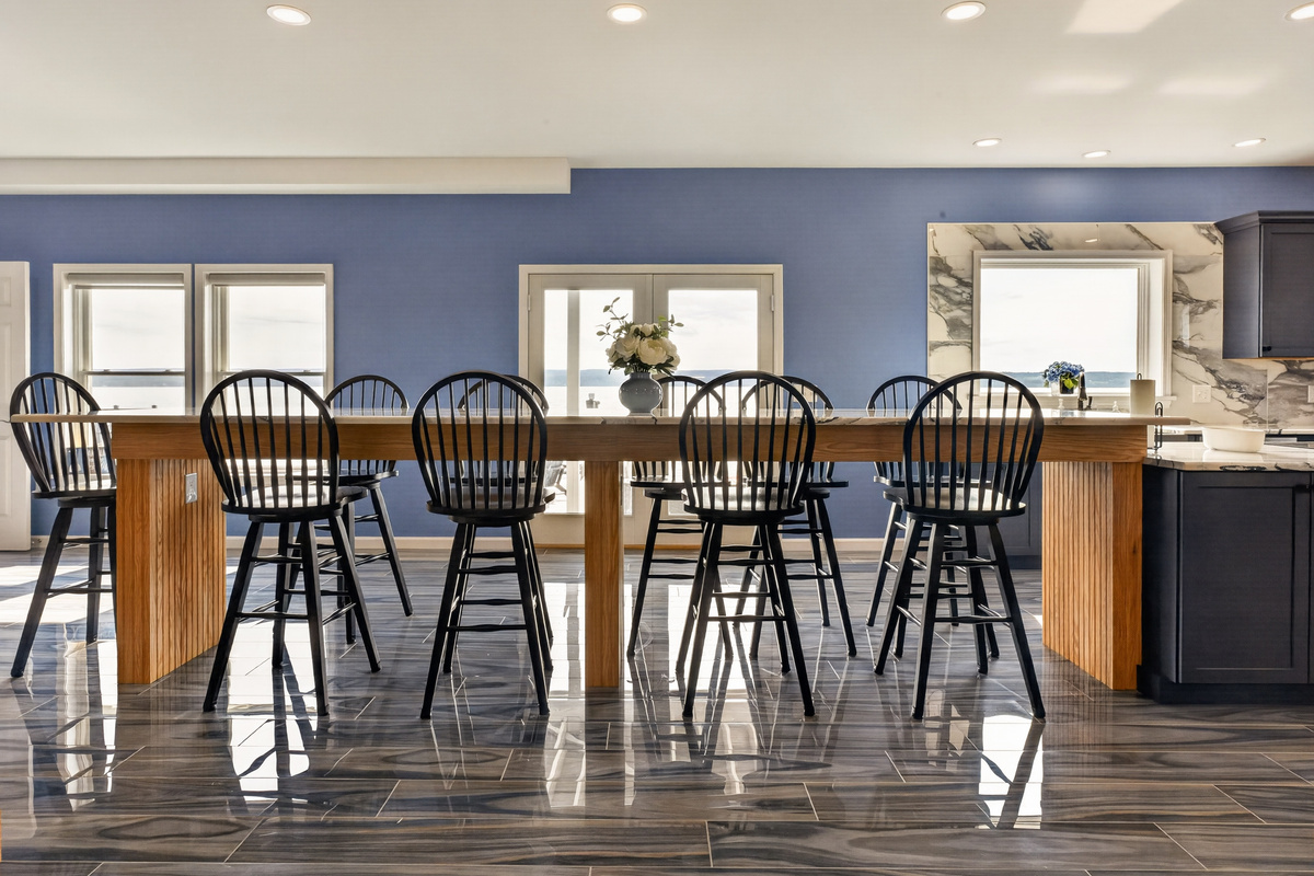 Dining table beside the open kitchen