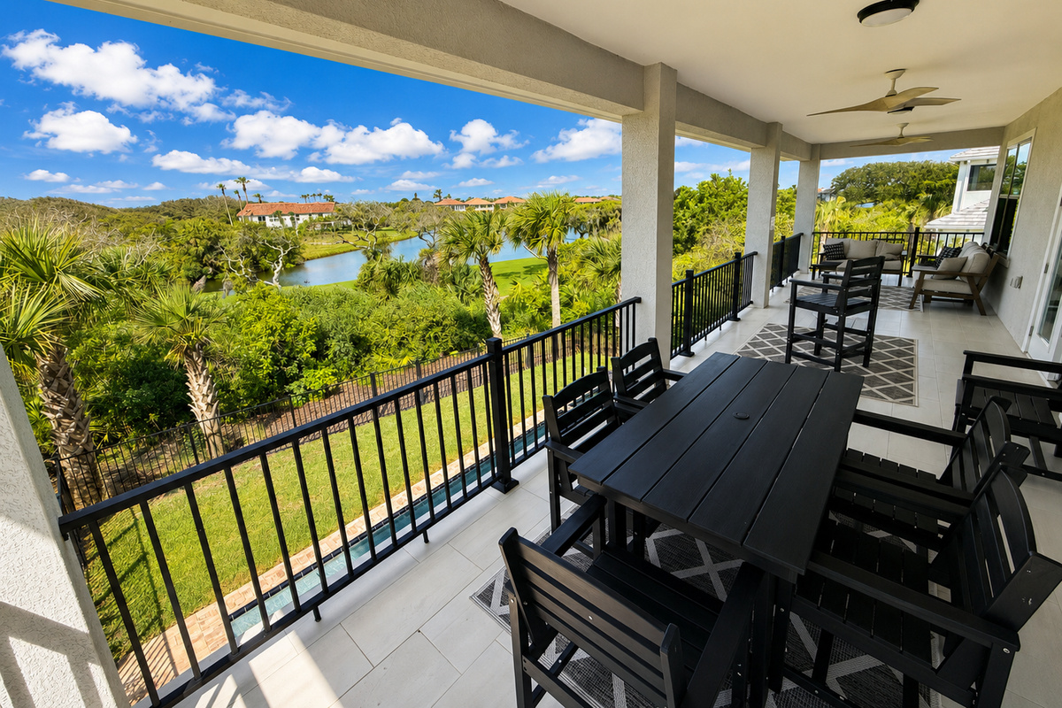 Wide open to the breeze and the sweeping golf-course view, this covered balcony is where your family will gather most. Morning coffee, afternoon card games, sunset dinners—pull up a chair, settle in, and let the good, slow hours simply roll by.