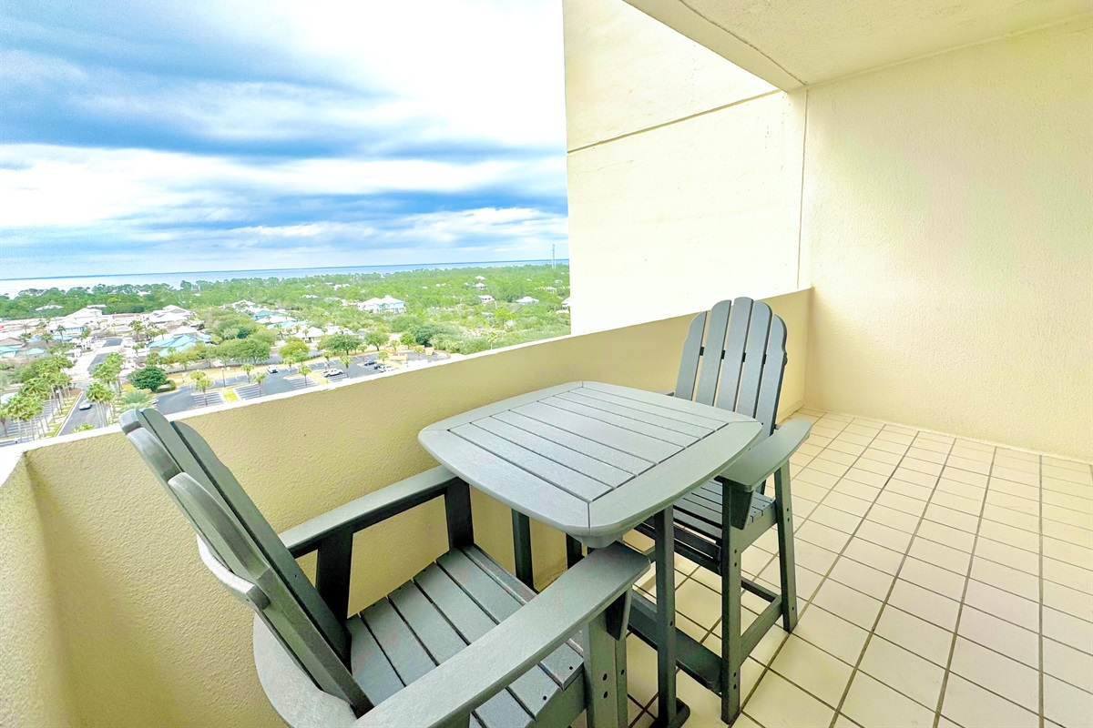 Enjoy views of the Mobile Bay and Beach Club grounds from this private balcony
