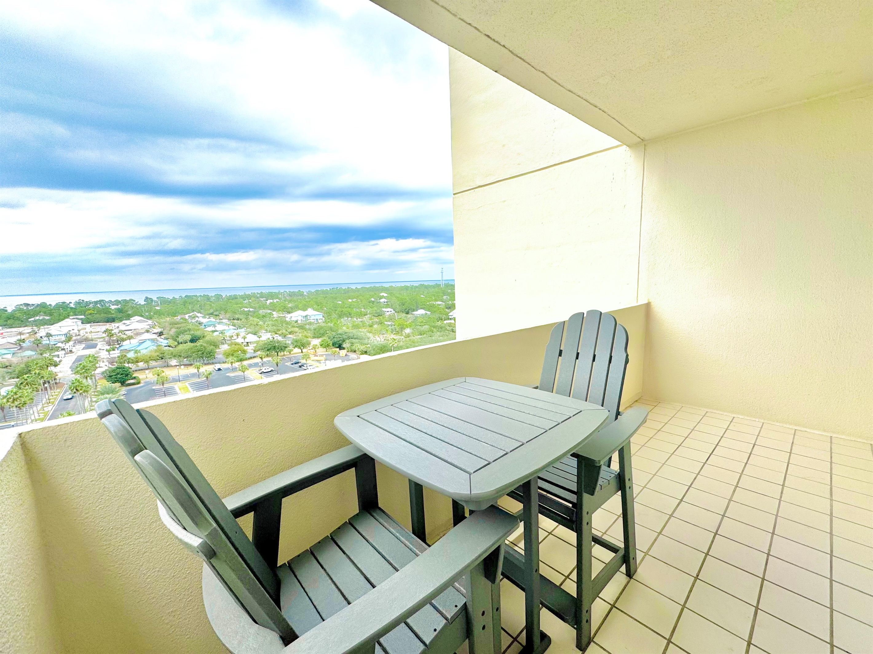 Enjoy views of the Mobile Bay and Beach Club grounds from this private balcony
