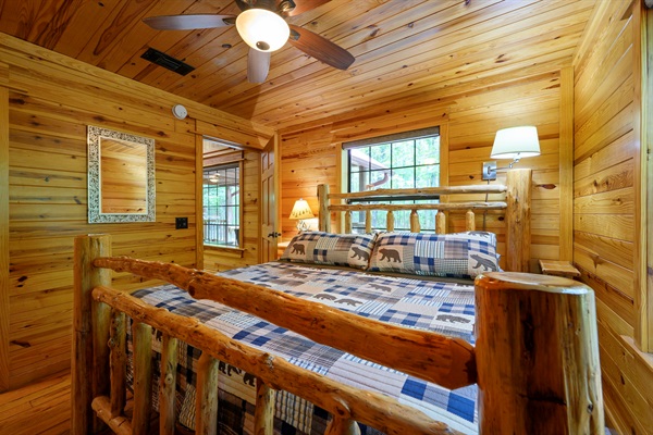 King size bed in Master bedroom rear of the cabin

