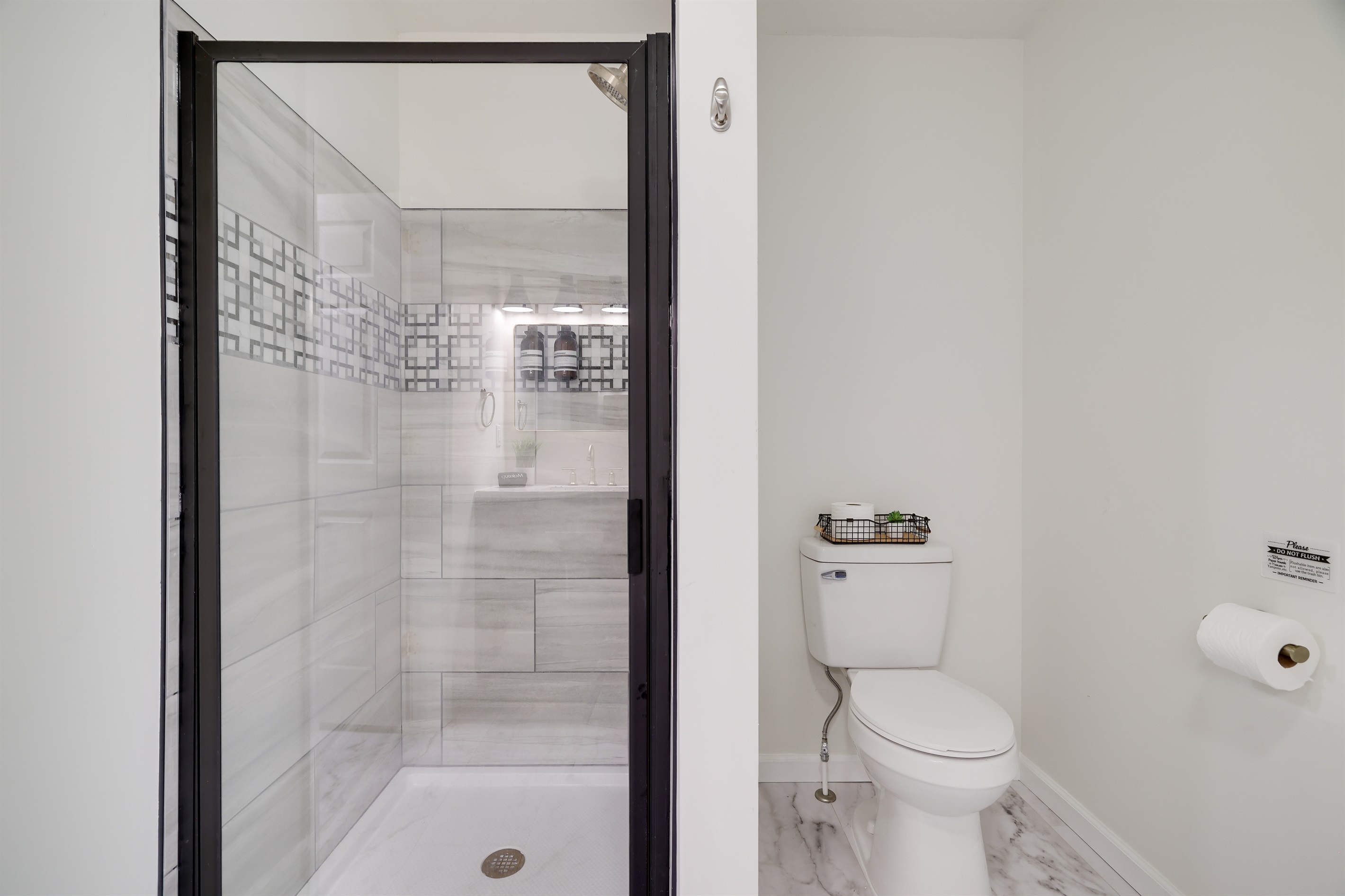 Relax and rejuvenate in the modern walk-in shower.