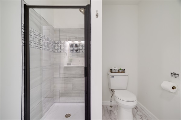 Relax and rejuvenate in the modern walk-in shower.