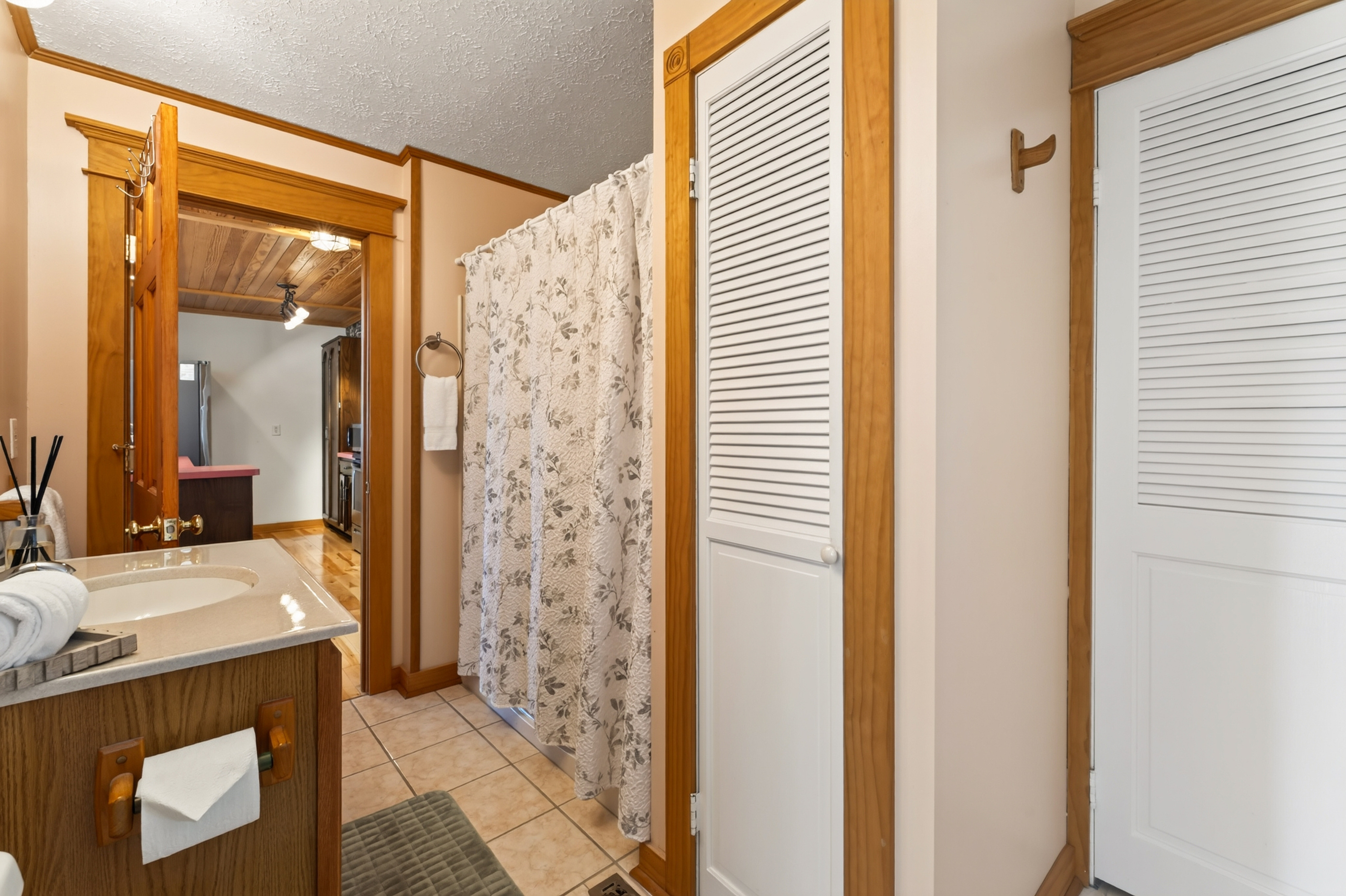 Bathroom with vanity and walk-in shower