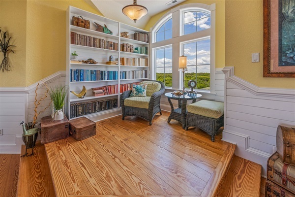 Surrounded by stories, grounded in comfort, and open to endless possibilities beyond the window.