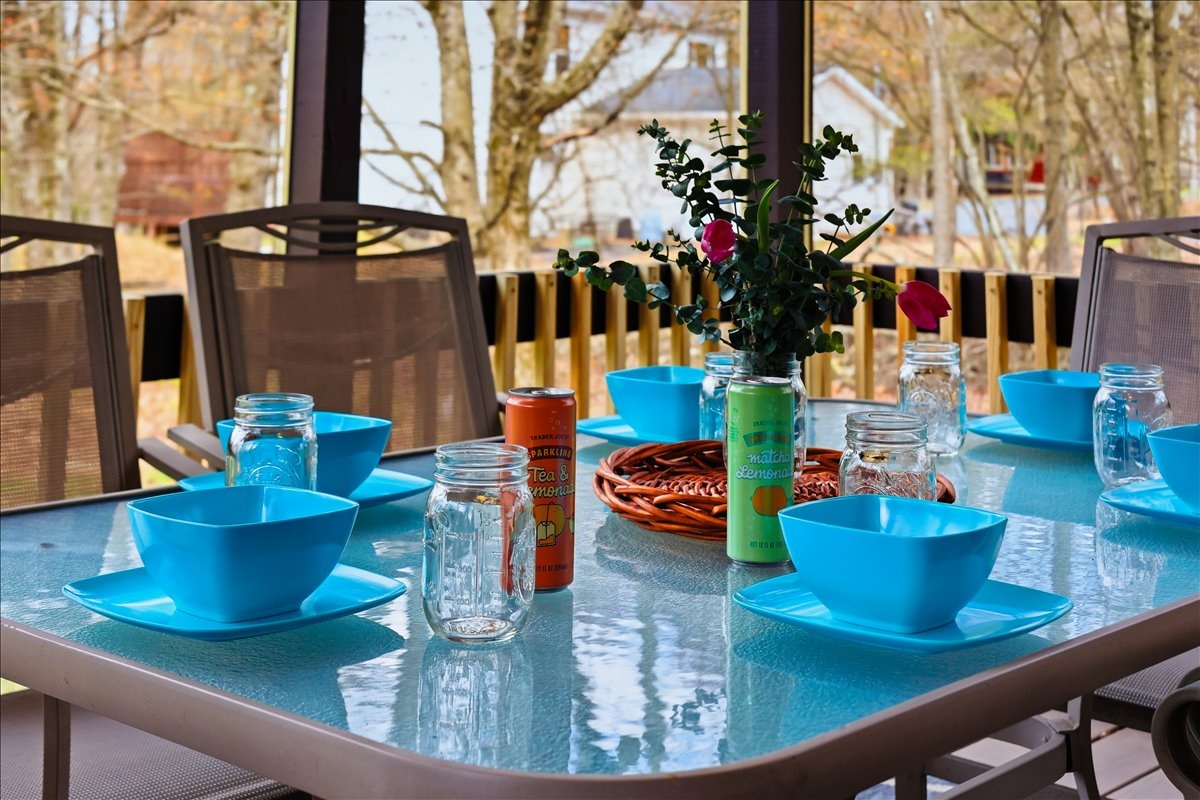 Set for a meal and ready for memories! The porch table comfortably seats the whole group