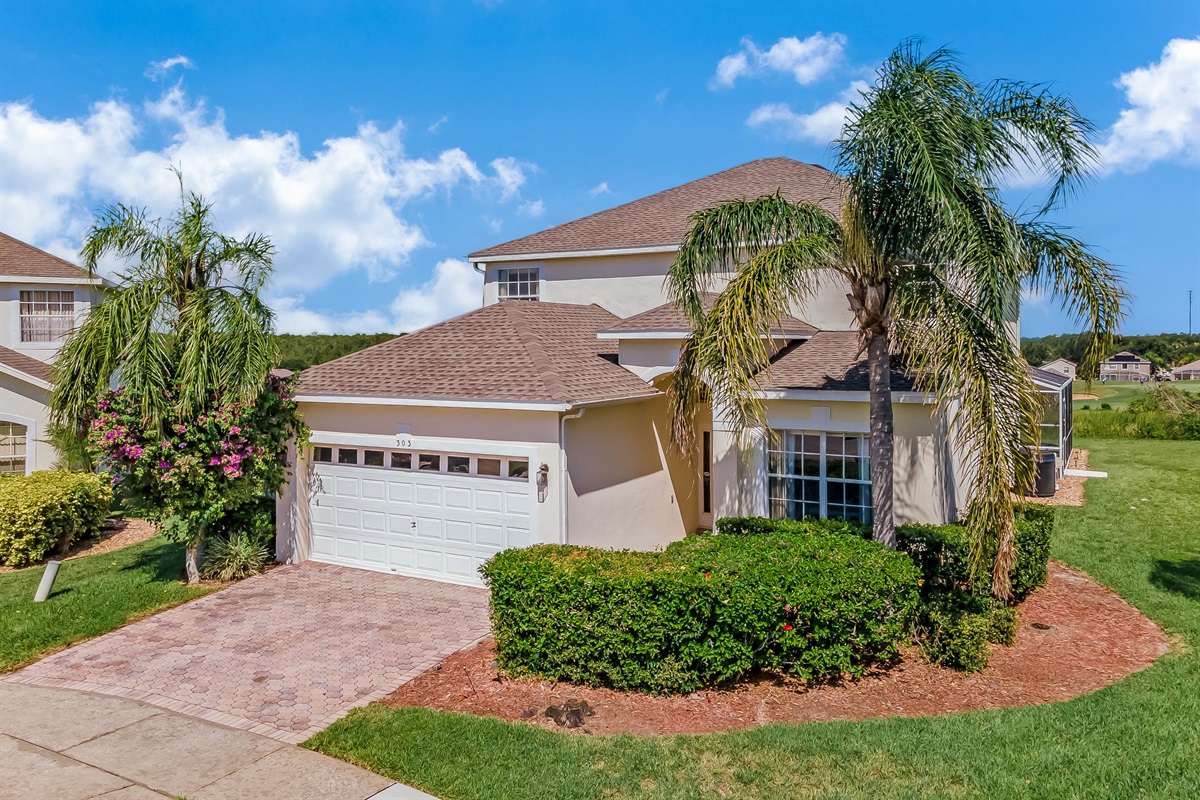 Room for two cars in the drive and more on the street.