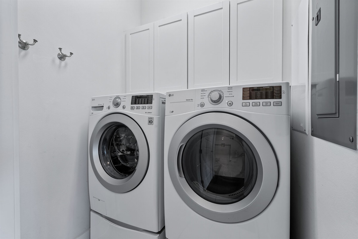 In-unit full-size washer and dryer.