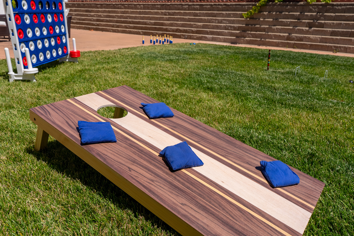 Enjoy a collection of lawn games in the backyard.