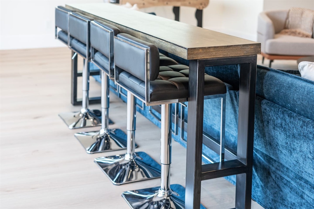 High-top bar seating, perfect for drinks, snacks, or game night.