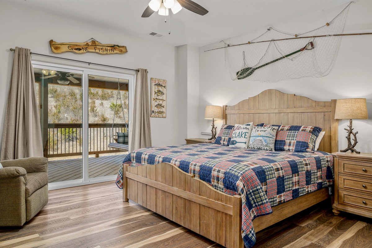 Upper level: Bright River room with King bed, recliner, private deck with cedar swing, and ensuite bathroom