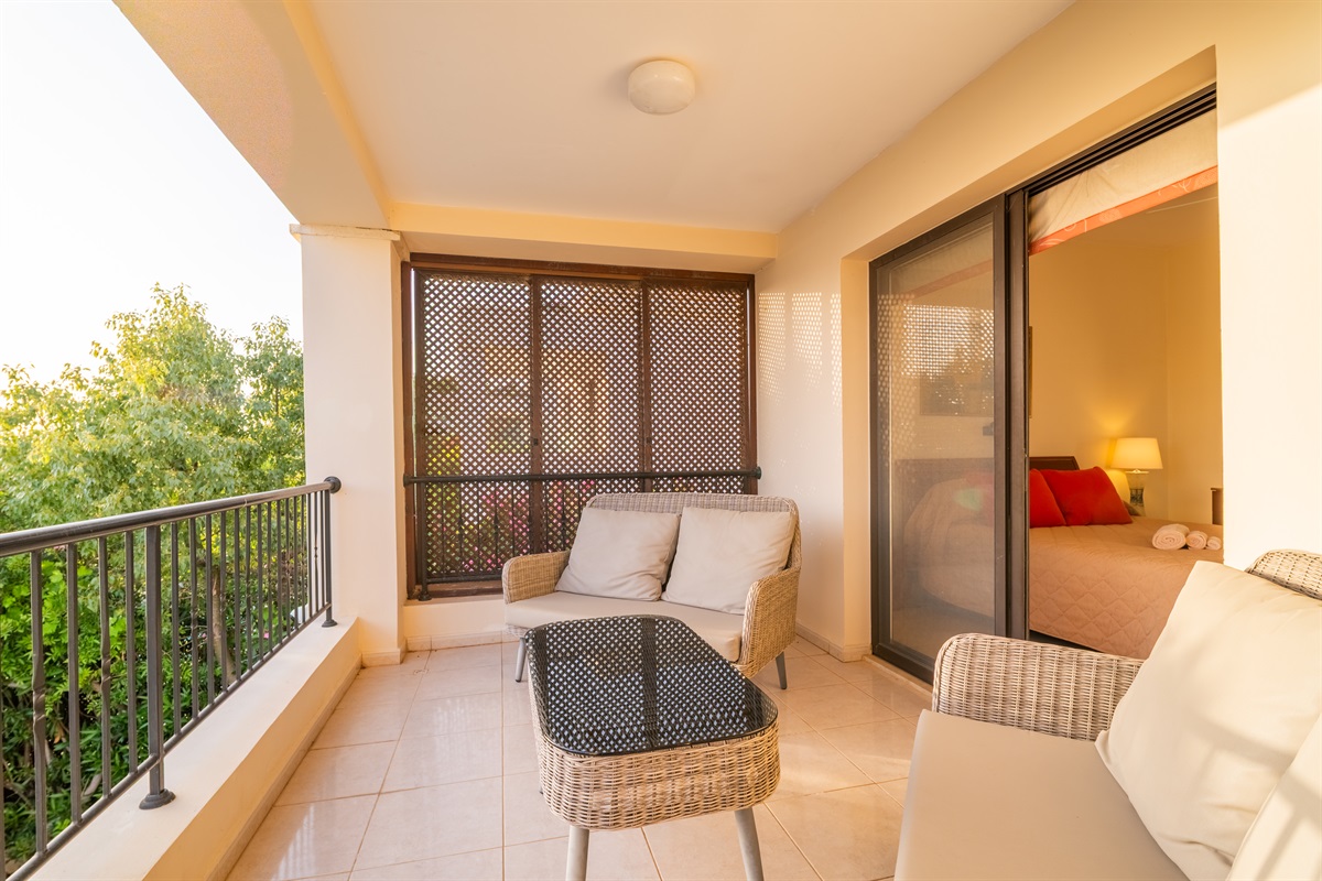 Balcony with stunning views off the master bedroom featuring comfortable seating for your morning coffee or evening drink.